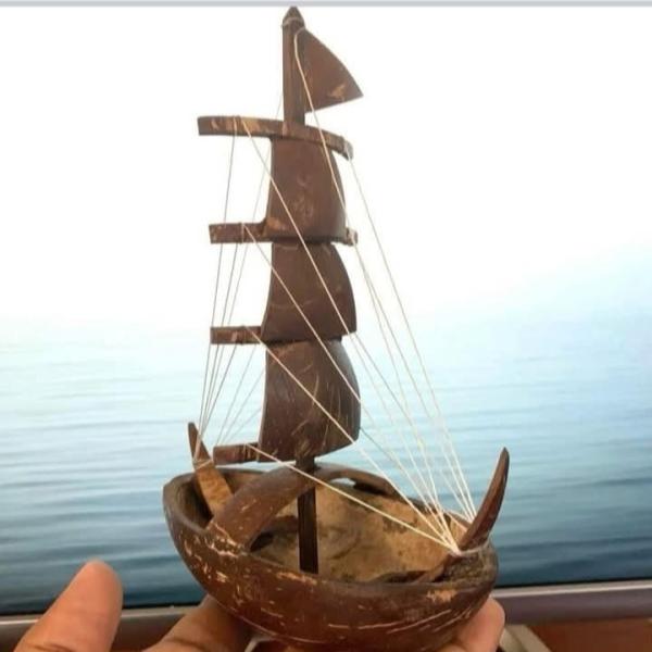 Handcrafted Small Ship Made from Natural Coconut Shells